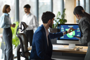People office analyzing checking finance graphs